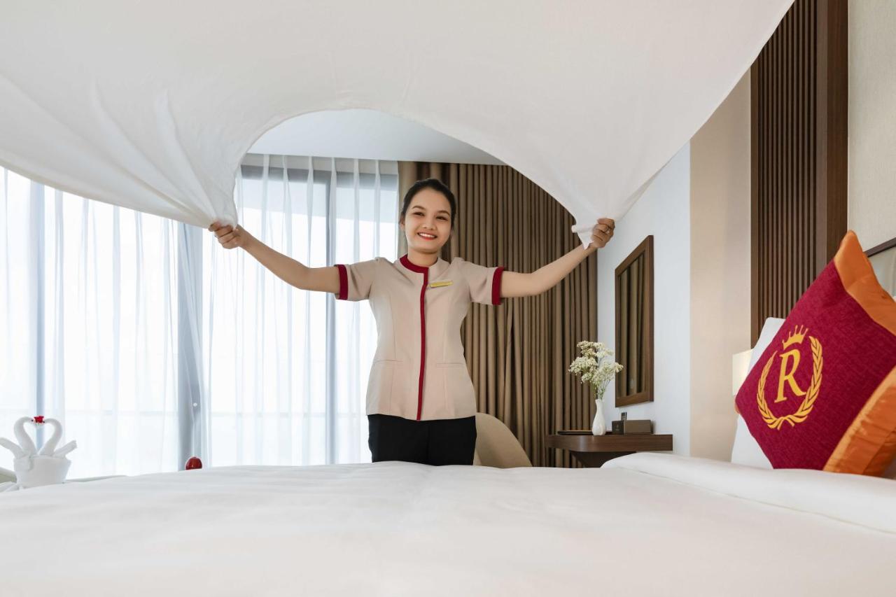 Regalia Gold Hotel Nha Trang Exterior photo A hotel maid making a bed