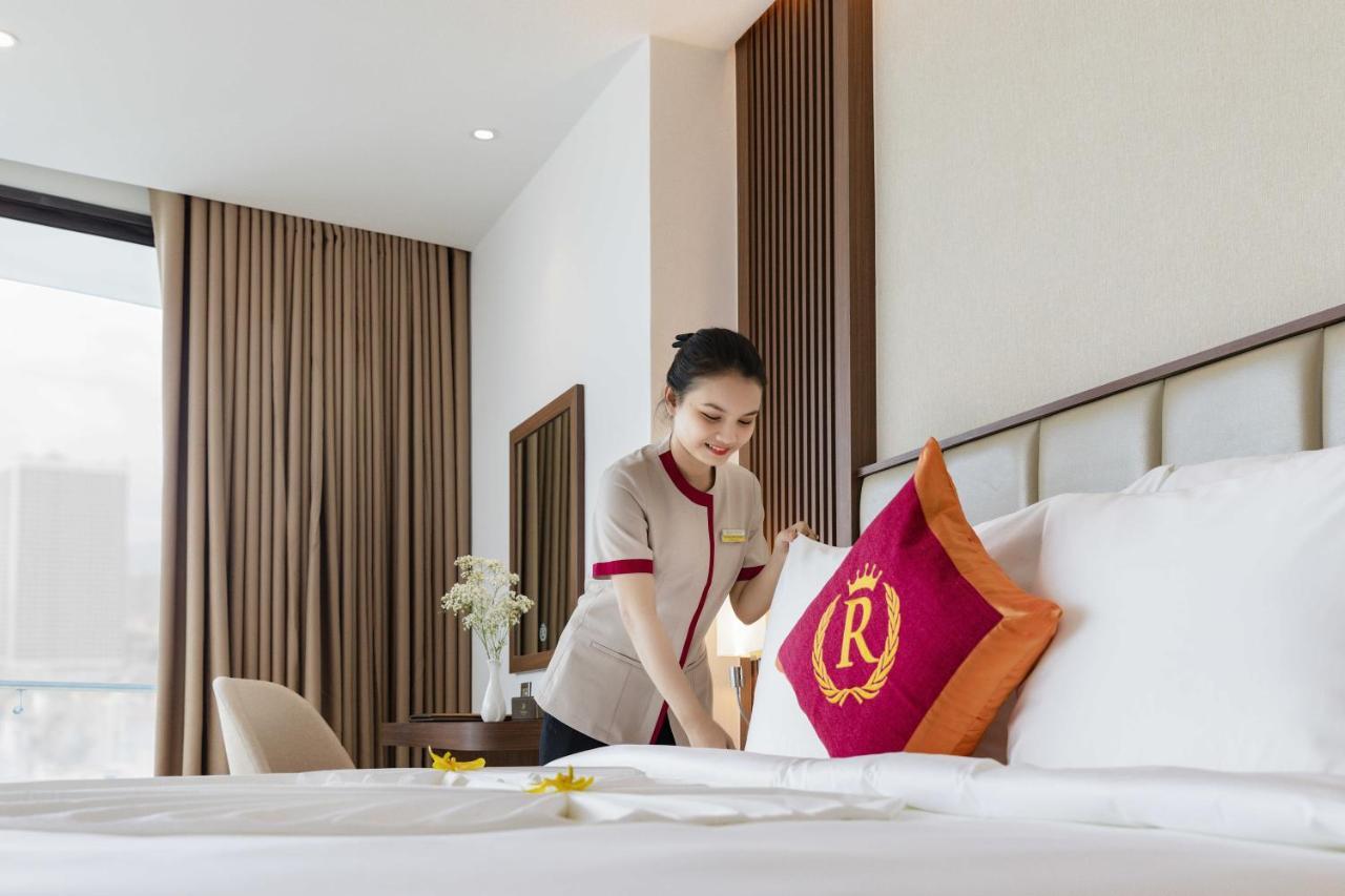 Regalia Gold Hotel Nha Trang Exterior photo A hotel maid making a bed